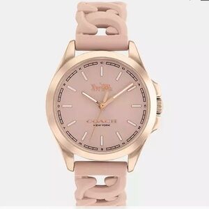 Coach watch completely new light pink gold tone case, signature rubber strap
